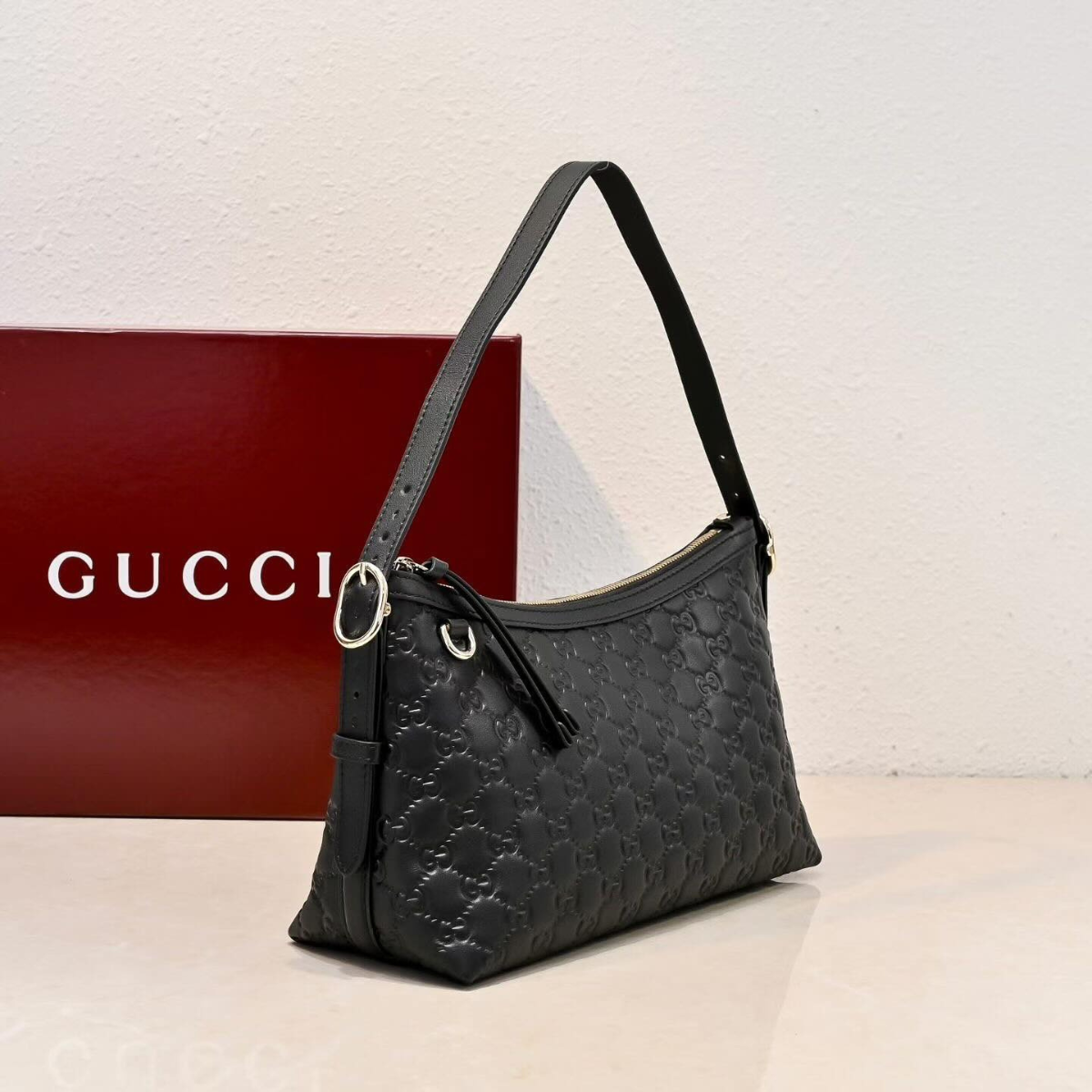 MEDIUM GG EMBLEM SHOULDER BAG GUCCI