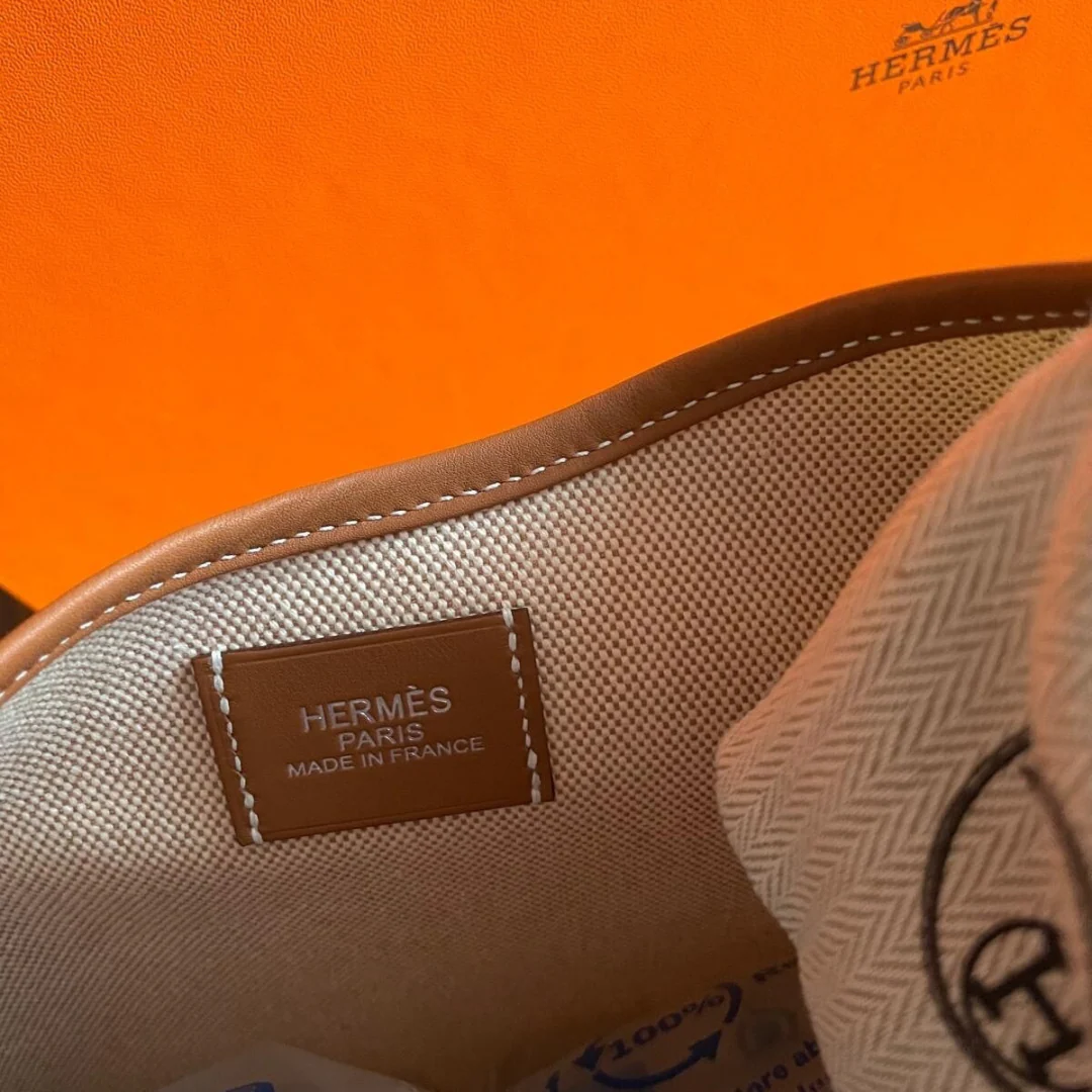 P’TIT ARÇON BAG IN CANVAS & LEATHER HERMÈS