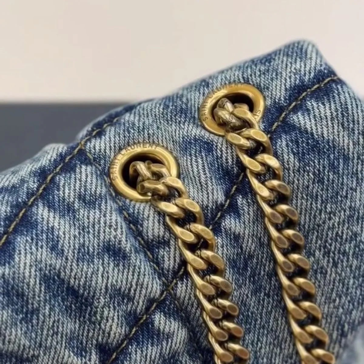 LOULOU PUFFER BAG IN QUILTED VINTAGE DENIM